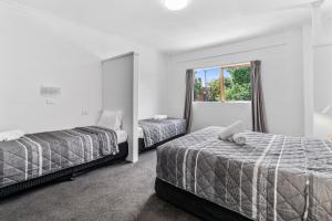Comfort Inn Commodore Albury客房内的一张或多张床位