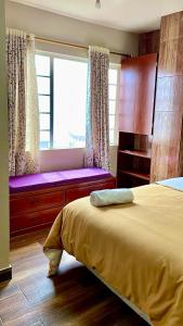 Postel nebo postele na pokoji v ubytování Casa de la Abuela Celica Hotel