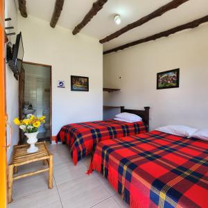 Postel nebo postele na pokoji v ubytování Posada Turistica Nakku + 37 fotografií