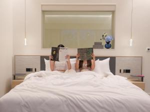 Postel nebo postele na pokoji v ubytování Veranda Pool Villas & Suite