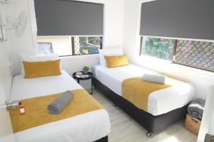 Postel nebo postele na pokoji v ubytování Yeppoon Beachhouse