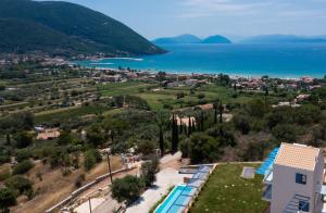 arial view of a resort with a view of the ocean at Calionas Suites in Vasiliki