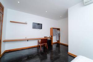 TV a/nebo společenská místnost v ubytování UMA Residence