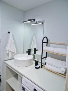 Postel nebo postele na pokoji v ubytování Cozy House New Gudauri
