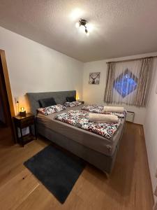 Ένα ή περισσότερα κρεβάτια σε δωμάτιο στο Kitzglück