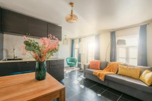 Posezení v ubytování Kokerelle vakantiewoningen + 8 fotografií