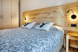 Posteľ alebo postele v izbe v ubytovaní Condominio Lucia 7