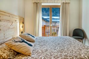 Posteľ alebo postele v izbe v ubytovaní Condominio Lucia 7