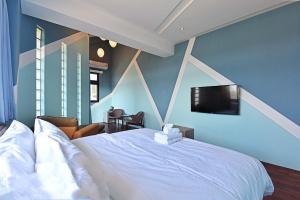 Voodi või voodid majutusasutuse Ocean View Hall B&B toas