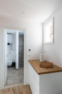 a bathroom with a sink and a toilet in a room at Room Odin in Dubrovnik