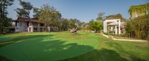 Сад в Lanna Inthan Resort
