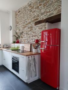 Η κουζίνα ή μικρή κουζίνα στο Superbe maison de campagne à deux pas de Nantes +10 φωτογραφίες