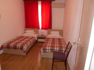 Postel nebo postele na pokoji v ubytování Springs Apartments & Rooms