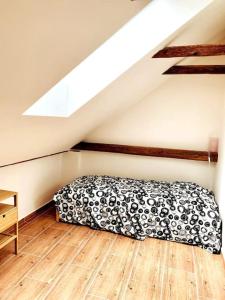 A bed or beds in a room at Útulný dům pro odpočinek
