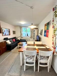 Posezení v ubytování Apartmán C01 Poustevník + 13 fotografií