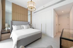 Postel nebo postele na pokoji v ubytování LUXSeaside/2BD/LaVie/JBR