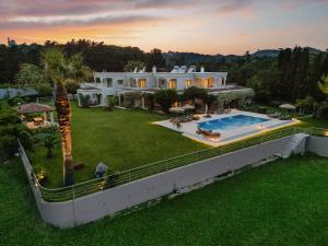 an aerial view of a house with a swimming pool at Bello Blu Estate Luxury Mediterranean Villa in Asgourou