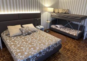 Postel nebo postele na pokoji v ubytování Hotel Continentale