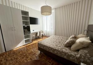 Postel nebo postele na pokoji v ubytování Hotel Continentale