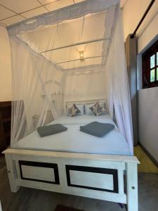 Postel nebo postele na pokoji v ubytování Cozy Home