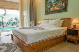 Ένα ή περισσότερα κρεβάτια σε δωμάτιο στο Villa Sensara 10 Rose Bali 3BR Luxury +43 φωτογραφίες