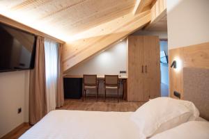 Posteľ alebo postele v izbe v ubytovaní Hotel Restaurant Castellarnau