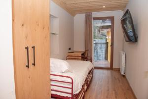 Posteľ alebo postele v izbe v ubytovaní Hotel Restaurant Castellarnau