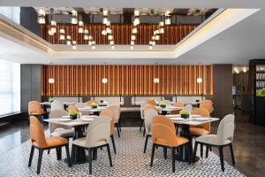 Restaurant o un lloc per menjar a Hampton by Hilton Guangzhou Renhe Baiyun Airport-Free Shuttle bus at Guangzhou Baiyun Airport