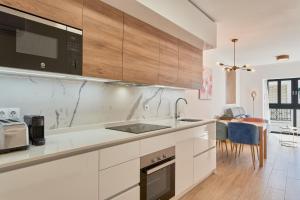 a kitchen with a sink and a counter top at Solaga - Nueva 22 in Nerja