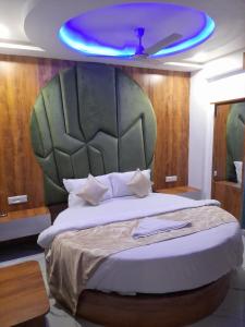 Tempat tidur dalam kamar di Hotel Era