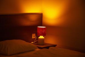 Ένα ή περισσότερα κρεβάτια σε δωμάτιο στο Hotel Time Out in Gudauri