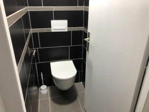 Ванная комната в app. 8 couchages tt confort