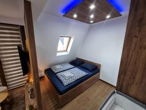 Ένα ή περισσότερα κρεβάτια σε δωμάτιο στο Luxury Apartment Borovi 2