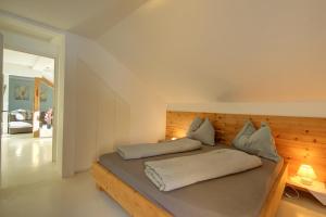 Кровать или кровати в номере Appartements Nagl Nassereith
