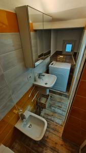 Ванна кімната в Nelly Bergamo Apartments