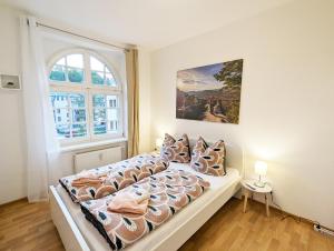 Postel nebo postele na pokoji v ubytování Urlaubsmagie - Sauna&Whirlpool zum Entspannen - HW1