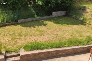 a large yard with grass and a fence at Gîte des Sagards in Saint-Michel-sur-Meurthe