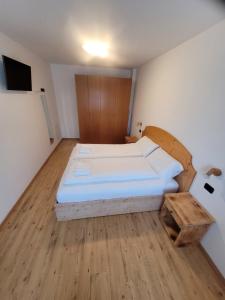 Postel nebo postele na pokoji v ubytování Casa Pontesana