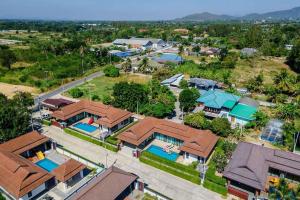 an overhead view of a house with swimming pools at Villa ABBIE ! Amazing Pool Villa for family and Friends in Hua Hin