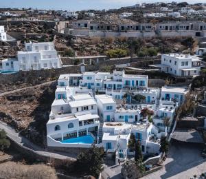 an aerial view of a cluster of white houses at Hotel Madalena in Mýkonos City