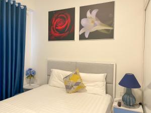 Ένα ή περισσότερα κρεβάτια σε δωμάτιο στο Minh An Homestay