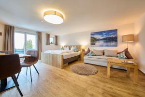 Postel nebo postele na pokoji v ubytování Apartments Lakeside 29 Zell am See + 37 fotografií