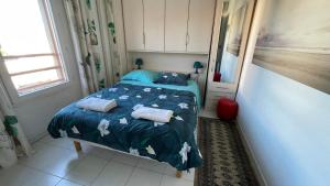 Posteľ alebo postele v izbe v ubytovaní Appartement Au Calme Tout Proche Du Centre