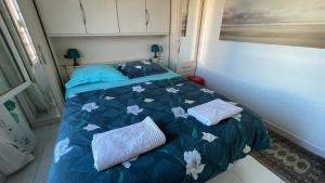 Posteľ alebo postele v izbe v ubytovaní Appartement Au Calme Tout Proche Du Centre