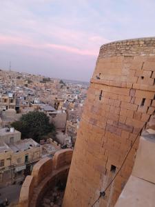 a view of a city from the top of a building at Hostel Magic Home Stay jaisalmer in Jaisalmer