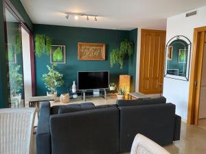 TV a/nebo společenská místnost v ubytování Charm Apartment 90m2