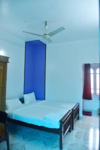 Krevet ili kreveti u jedinici u okviru objekta Suryas Rooms