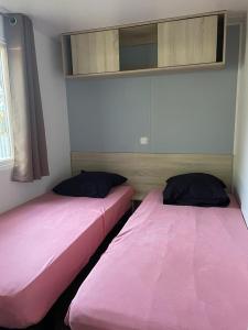 Voodi või voodid majutusasutuse Mobil-home 177 toas