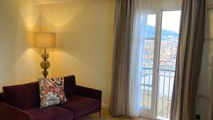 Posezení v ubytování Hôtel Des Gouverneurs