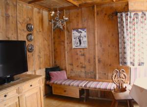 TV a/nebo společenská místnost v ubytování Haus Alice